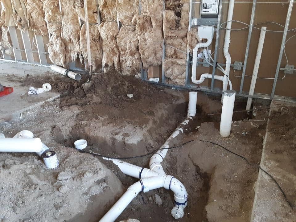 Waste and vent rough-in against a framed wall